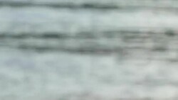 Defocused slow motion of fresh water river waves and ripples Stock Footage