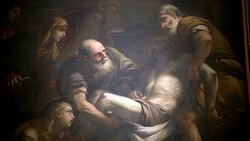 PAN LEFT TO RIGHT MEDIUM ANGLE OF PAINTING OR MURAL OF JOSEPH OF ARIMATHEA AND THE WOMEN TAKING BODY OF JESUS CHRIST AFTER DEATH. RELIGIOUS ART. COULD BE IN CHURCH. SERIES. Stock Footage