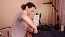 Dressmaker cuts out fabric. Stock Footage