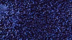 Dropping Raw plastic granules for industry on a pile Stock Footage