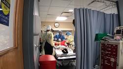 ONLY ON AP: NY emergency room battles COVID-19 Instructional Video