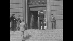 Indicted business magnate Samuel Insull with his attorney Floyd Thompson and his brother Martin enter Cook County Criminal Court Building in Chicago News Clip