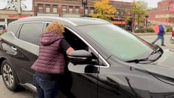 CLEAN : Volunteers in Boston suburb try to convince residents to vote News Clip