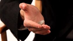 How to Do the Appearing Half Dollars Trick Instructional Video