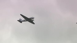 Dakota aircrafts flying overhead at Imperial War Museum Duxford as part of the D-Day 75 anniversary commemorations News Clip