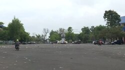 CLEAN : Flowers laid outside Indonesian stadium after football stampede News Clip