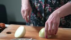 Woman cutting onion Stock Footage