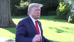 Trump says he doesn't know 2 charged businessmen News Clip