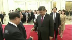 Kim Jong-un greets China's Xi Jinping News Clip