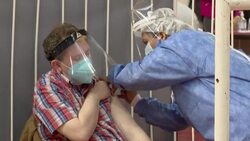 CLEAN : Argentina: independent healthcare workers get vaccine in the River Plate Stadium News Clip