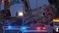 CLEAN : Heavy machinery and workers at site of US collapsed condo News Clip