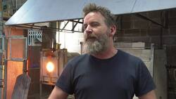Skill and artistry produce high-end sculptures at glass blowing studio Instructional Video