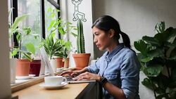 Freelance businesswoman working in a cafe Stock Footage