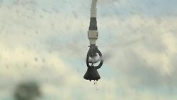 Pivot irrigation system. 120fps slow-motion close-up of pivot sprinkler system irrigating crops. Irrigation pivot system watering agriculture field Stock Footage