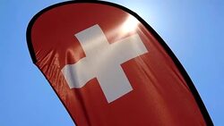 Swiss Banner Flag with Sunlight Stock Footage