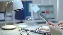 Medical hands holding tablet at workplace. Doctor using tablet computer Stock Footage