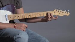 How to Play an E Flat 7 / D Sharp 7 Barre Chord on Guitar Instructional Video