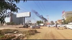 CLEAN : Smoke billows after gunfire at two bases of feared Sudan security agency News Clip