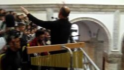 CLEAN : Choir rehearses before Pope's visit to small Iraqi Christian village News Clip