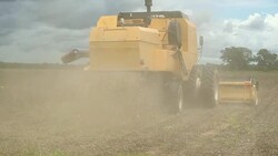 Tractor harvesting agriculture in 120fps slow-motion Stock Footage