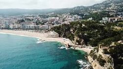 View from drone of Spanish town of Lloret de Mar Stock Footage