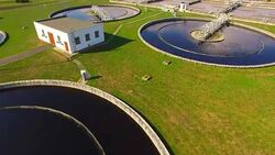 Aerial view to sewage treatment plant. Grey water recycling. Waste management theme. Stock Footage