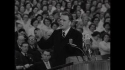US evangelist Billy Graham preaches to huge crowd in Kelvin Hall in Glasgow, Scotland News Clip