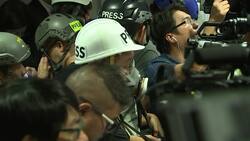 HK police warn on dangers of covering protests Instructional Video
