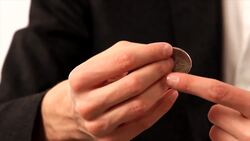 How to Back Palm a Coin Instructional Video
