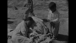Thousands of suffering Korean War refugees in field and in makeshift hospital News Clip