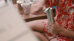 Young woman using coffee grinder at home. Stock Footage