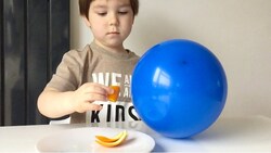 How to Pop Balloons with an Orange Peel Instructional Video