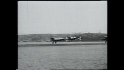 March 5th 1936, first Spitfire flight. Spitfires in military service, WW2 combat. Spitfire factory production. Stock Footage