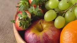 4k Rotate of mix fruit in wooden bowl. Stock Footage