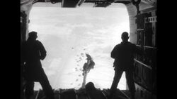C-119 planes drop parachuted supplies; landings during the Korean War News Clip