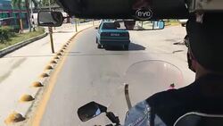 Santa Clara, Cuba: Point of view from the passenger cabin of a 'motoneta' Stock Footage