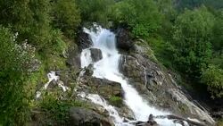 View waterfall scenes in mountains, national park Dombai, Caucasus, Russia Stock Footage