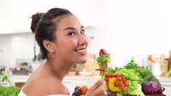 Beautiful Young woman eating salad Stock Footage