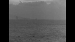 During World War II, US military assaulting Japanese forces Tarawa in the Gilbert Islands; transport barges head ashore News Clip