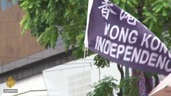 HK police fire tear gas at rally against proposed security law News Clip