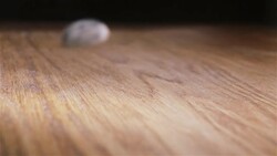 Sunflower Seeds authentic Slow-Motion falling on wooden table, close up Stock Footage