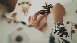 Artist hand making flower paper craft gift Stock Footage