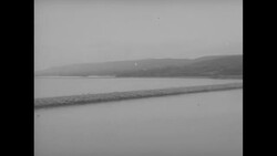 Canadian Minister of Trade Howe cuts ribbon at ceremony to open Canso Causeway linking mainland with Cape Breton Island in Nova Scotia News Clip