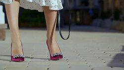 Beautiful female legs on a city street Stock Footage