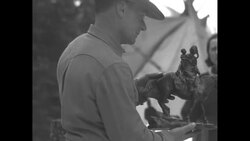 Cowboy sculptor Charles A. Beil shows off some of his latest work News Clip