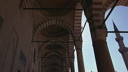 UP ANGLE OF STRIPED POINTED ARCHES AND CEILING. COULD BE SULEYMANIYE MOSQUE. ISLAMIC ARCHITECTURE. Stock Footage