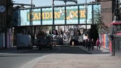 Wide shot of light traffic travelling through Camden News Clip