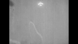 Pilot Jarecki celebrated after bringing MIG out of Poland; arrives at airport; parade in Chicago News Clip