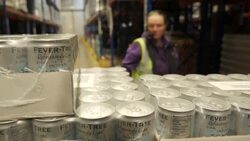 Workers moving pallets at cold storage warehouse News Clip