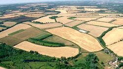 Aerials of dry yellow fields across Hampshire News Clip